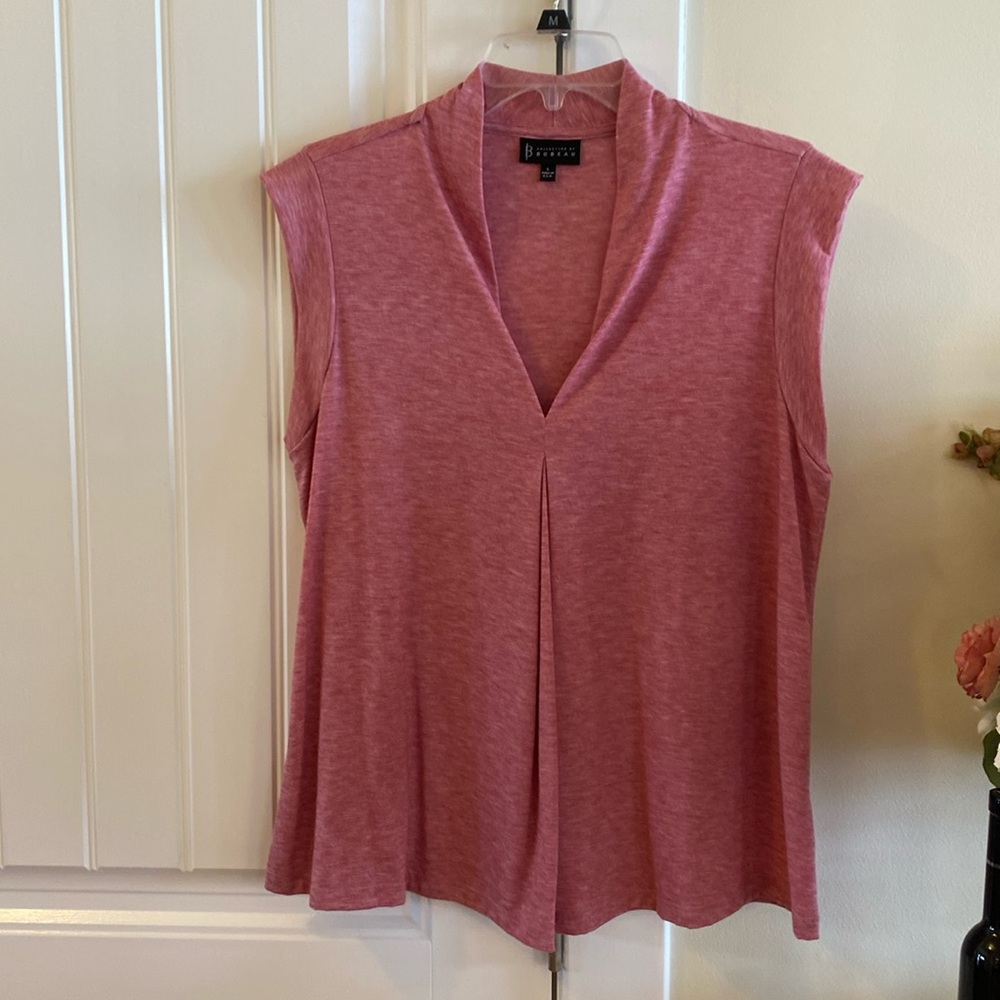 Womens top. Can be worn alone, or under a jacket or sweater